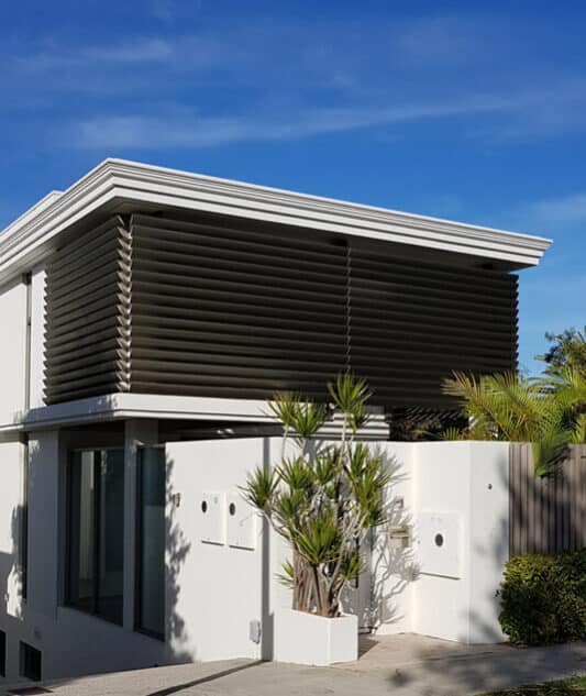 150 Midi Louvres frameless drive 
Bronze anodised finish. Cottesloe WA